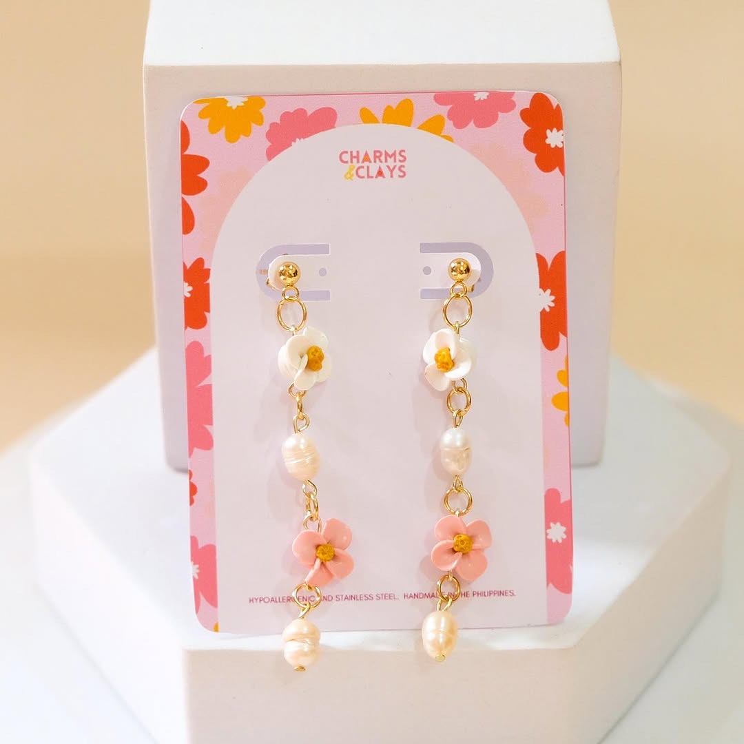Lily earrings from Spring Haven collection — white and pink clay flowers with pearl drops